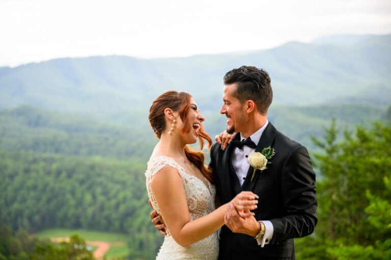 Couple dancing and laughing during their elopement at The Great Smoky Mountains National Park by wedding photographer Tonya Damron Photography